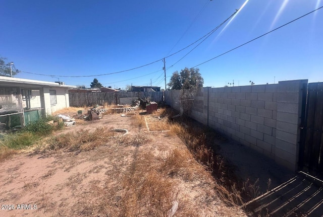 view of yard featuring fence