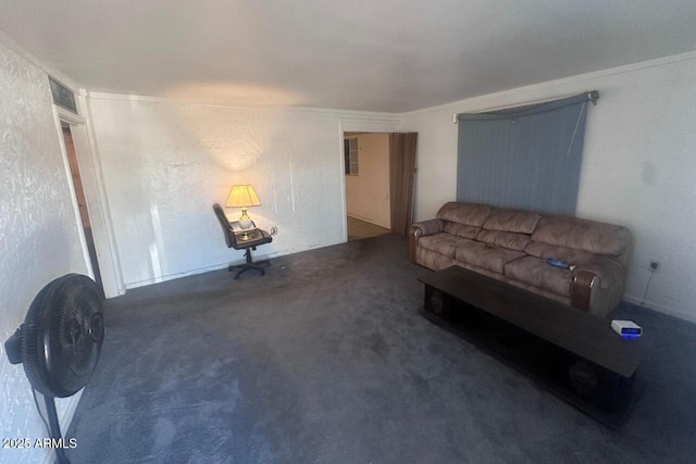 living area featuring carpet floors and a textured wall