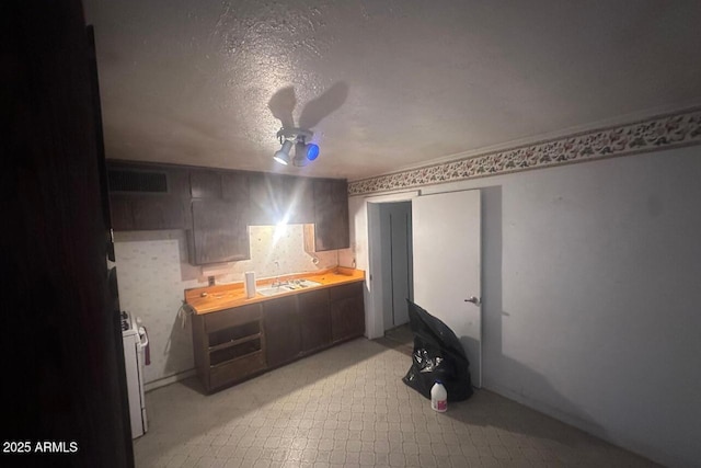 bedroom featuring a ceiling fan and visible vents