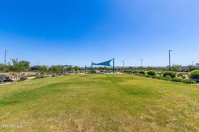 16750 W Evergreen Rd, Waddell, AZ 85355 - surrounding community with a yard