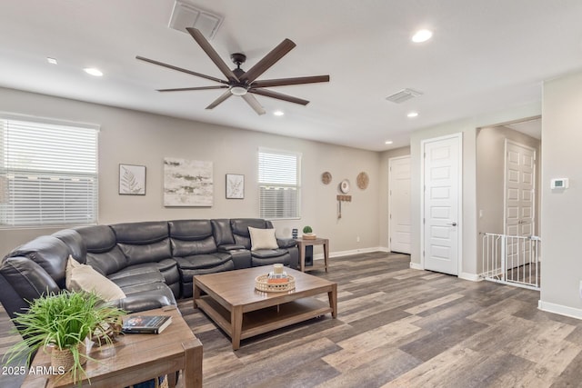 16750 W Evergreen Rd, Waddell, AZ 85355 - living room featuring a ceiling fan, recessed lighting, wood finished floors, and baseboards