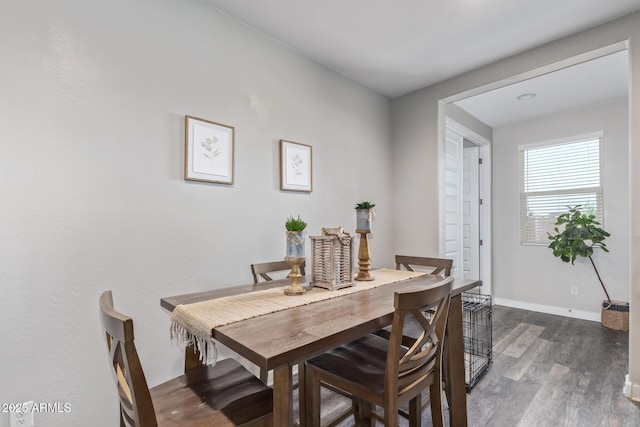 16750 W Evergreen Rd, Waddell, AZ 85355 - dining area with wood finished floors and baseboards