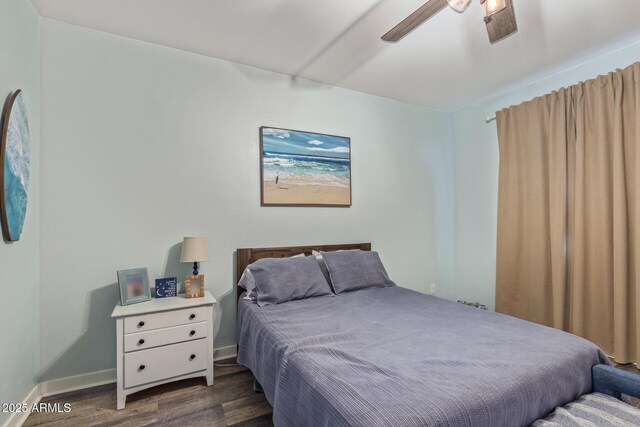 16750 W Evergreen Rd, Waddell, AZ 85355 - bedroom featuring dark wood-type flooring, baseboards, and ceiling fan