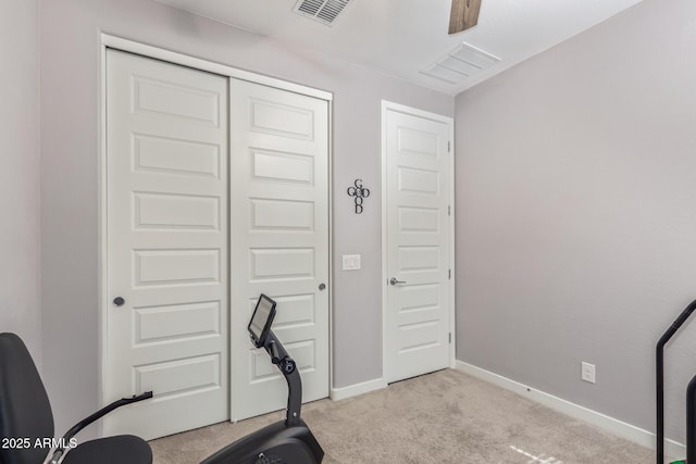 16750 W Evergreen Rd, Waddell, AZ 85355 - exercise room featuring light carpet and baseboards
