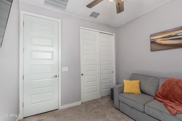 16750 W Evergreen Rd, Waddell, AZ 85355 - sitting room with carpet, a ceiling fan, and baseboards