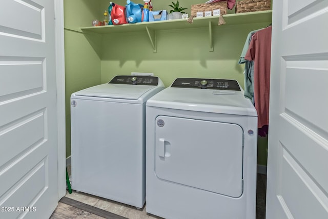 16750 W Evergreen Rd, Waddell, AZ 85355 - laundry area featuring washer and dryer and light wood-style flooring