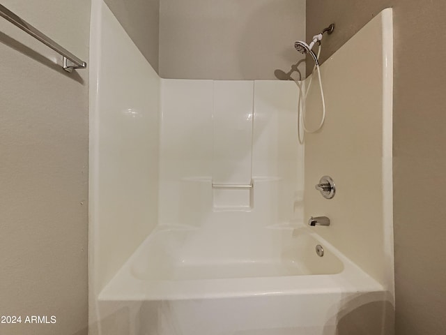 bathroom featuring washtub / shower combination