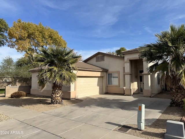 view of front of home with a garage