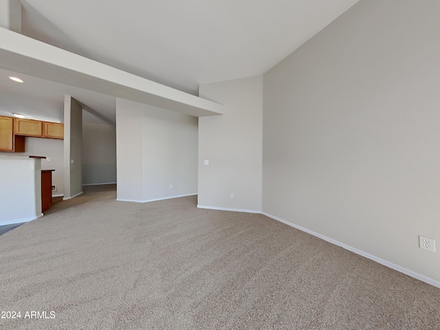 interior space featuring light colored carpet