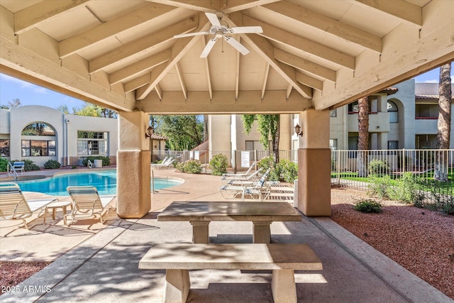 view of patio / terrace with a community pool and ceiling fan