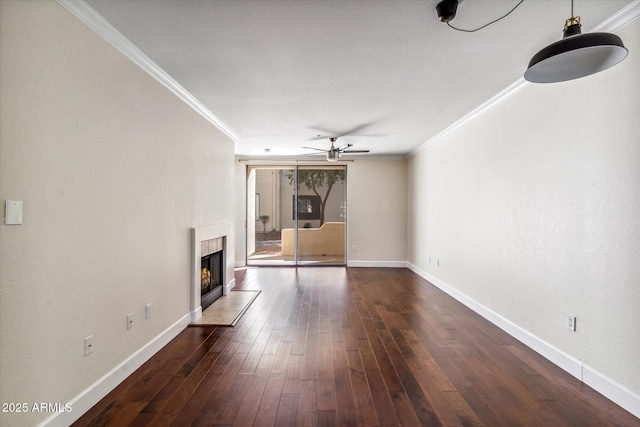 unfurnished living room with dark hardwood / wood-style flooring, crown molding, and ceiling fan