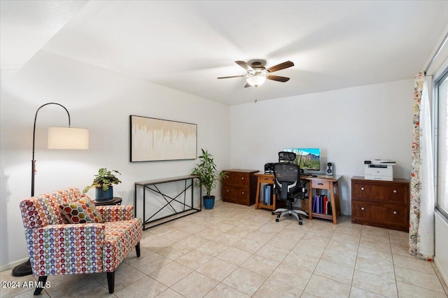 home office featuring ceiling fan and light tile patterned floors