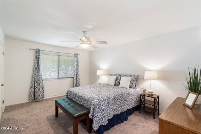 bedroom featuring ceiling fan and carpet flooring