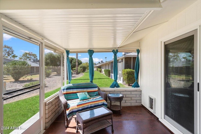 sunroom with heating unit