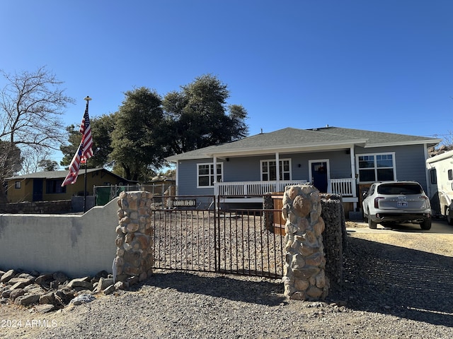 view of front of property featuring covered porch