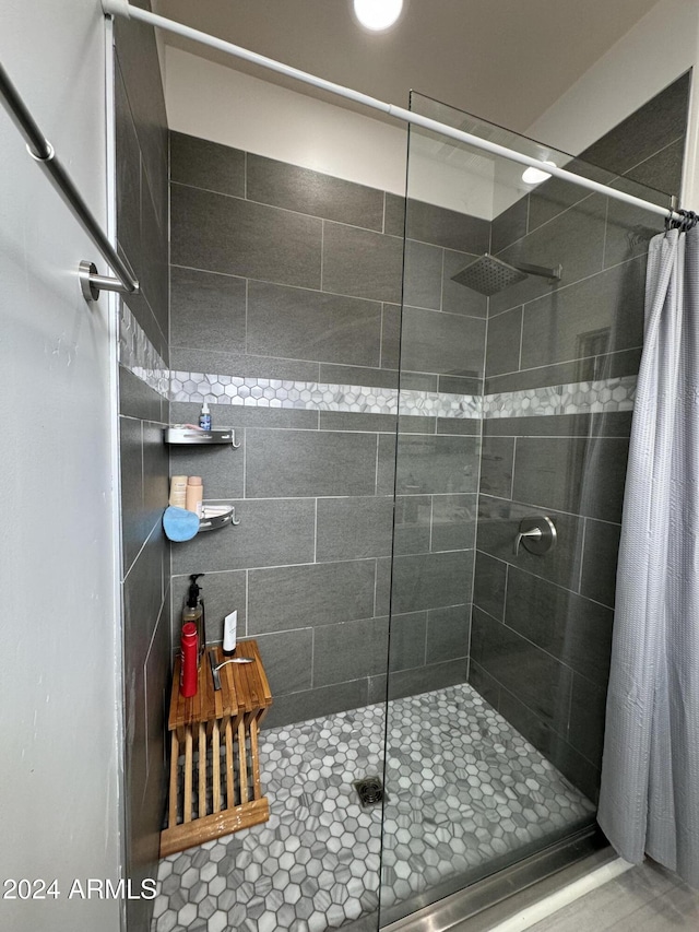 bathroom with a shower with curtain