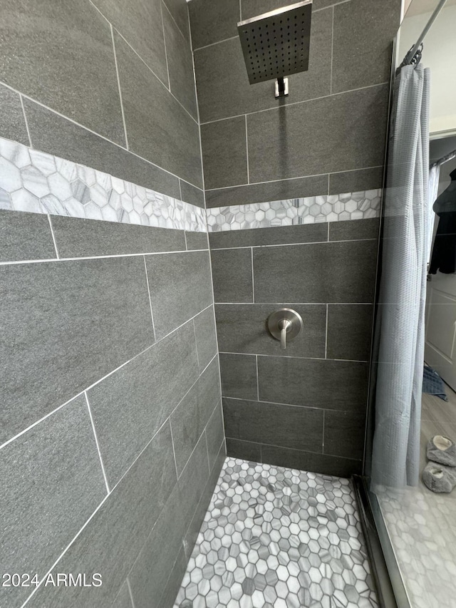 bathroom featuring walk in shower