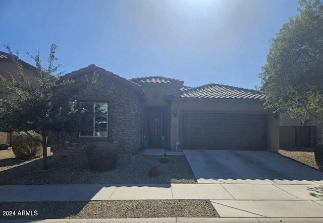 view of front of property with a garage