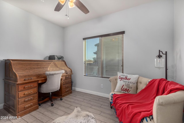 home office featuring ceiling fan and light wood-type flooring