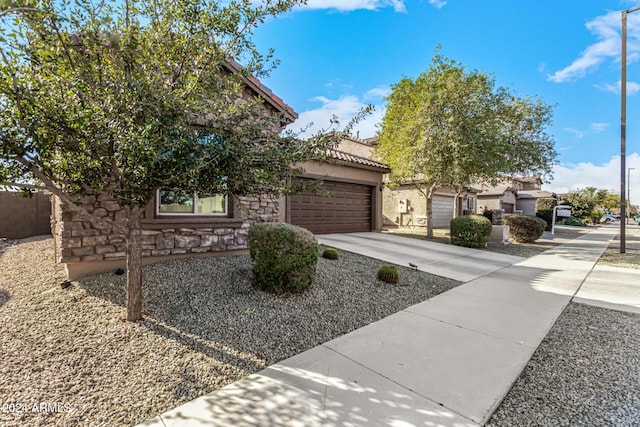 view of front of home with a garage