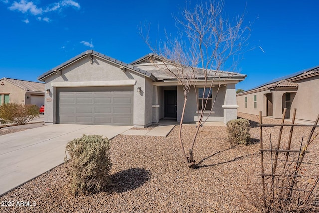 ranch-style home featuring stucco siding, a garage, concrete driveway, and a tiled roof