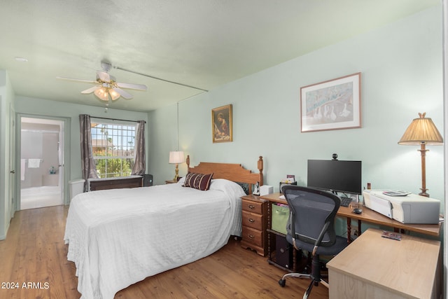 bedroom with wood-type flooring and ceiling fan