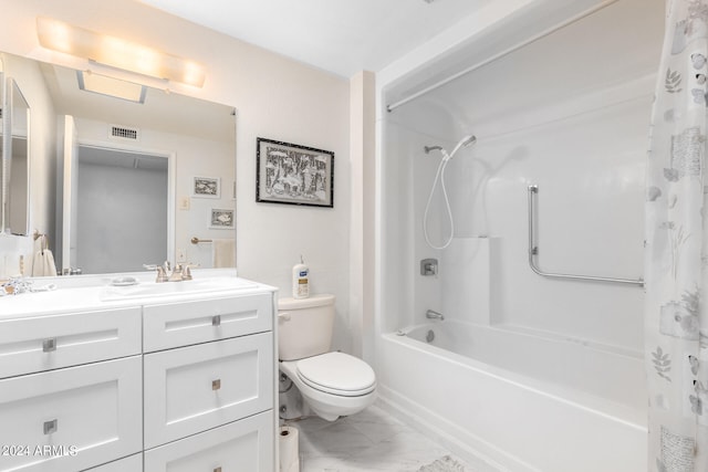 full bathroom featuring shower / bath combo, toilet, and vanity