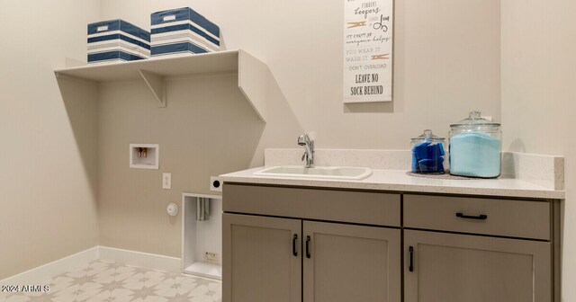 bathroom with vanity, baseboards, and tile patterned floors