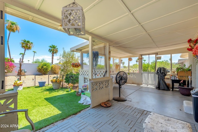 view of patio featuring fence