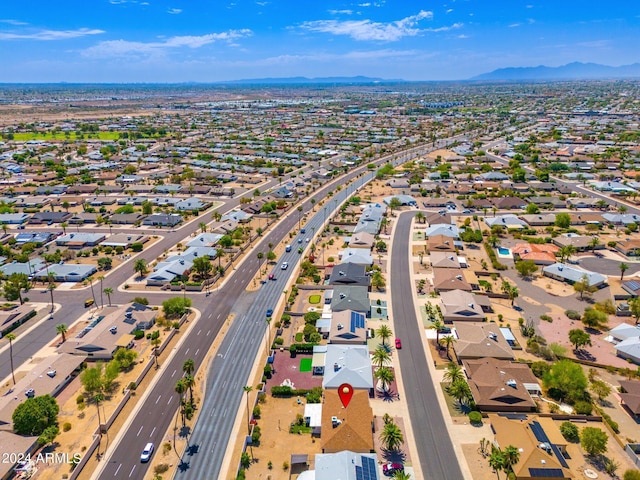 drone / aerial view featuring a mountain view and a residential view