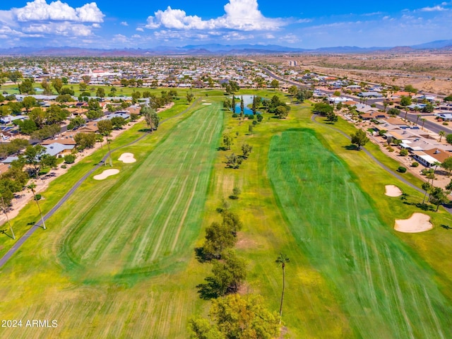 aerial view with a mountain view and golf course view