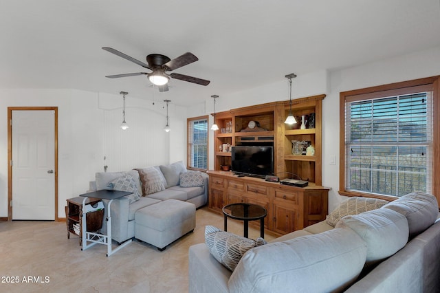 living room featuring ceiling fan