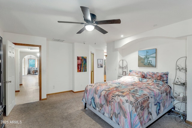 carpeted bedroom featuring ceiling fan