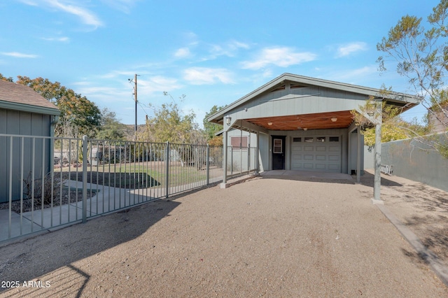 view of front of home featuring a garage and a front yard