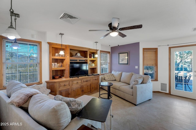 living room with ceiling fan