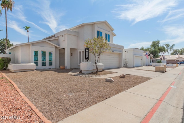 view of front of property featuring a garage