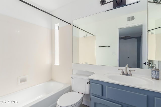 full bathroom featuring vanity, shower / bath combination, and toilet