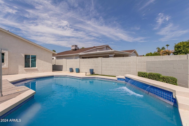 view of pool featuring pool water feature