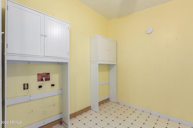 washroom with cabinets