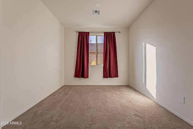 view of carpeted spare room