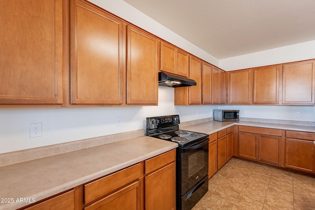 kitchen featuring black range with electric stovetop