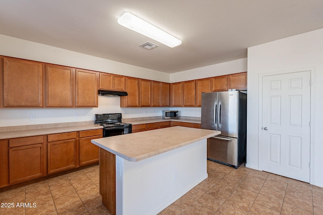 kitchen featuring appliances with stainless steel finishes and a center island