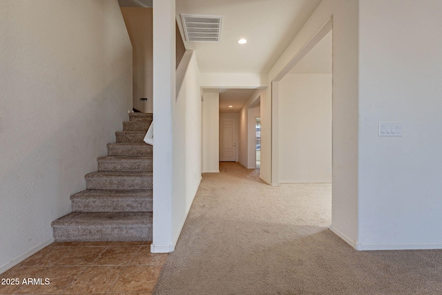 stairway with carpet flooring