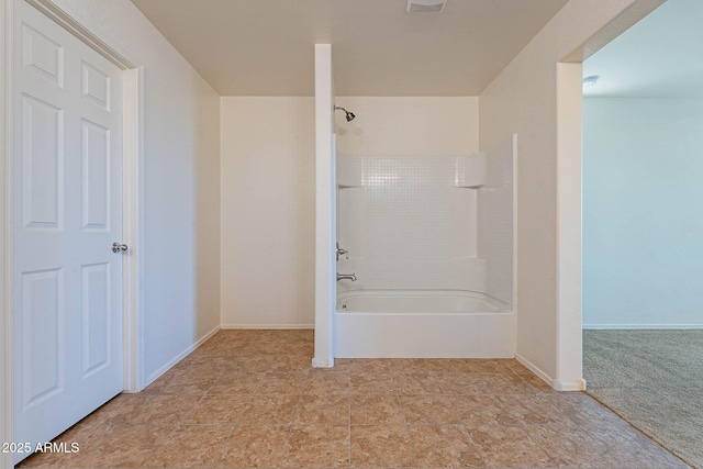 bathroom with shower / bathing tub combination