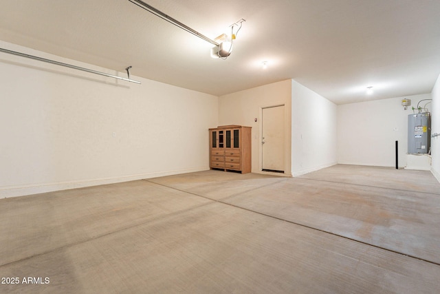 garage with water heater and a garage door opener