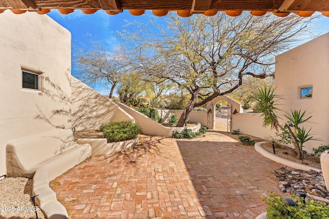 view of patio / terrace with a gate and a fenced backyard