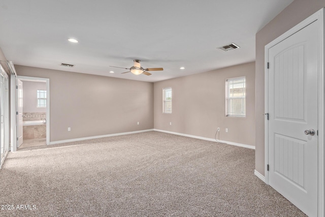3034 E Turney Ave, Phoenix, AZ 85016 - unfurnished bedroom featuring carpet floors, recessed lighting, baseboards, ensuite bath, and ceiling fan