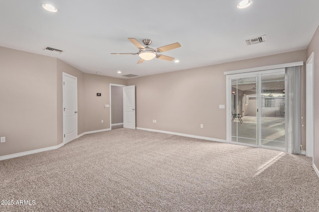 3034 E Turney Ave, Phoenix, AZ 85016 - empty room with carpet flooring, a ceiling fan, baseboards, and recessed lighting