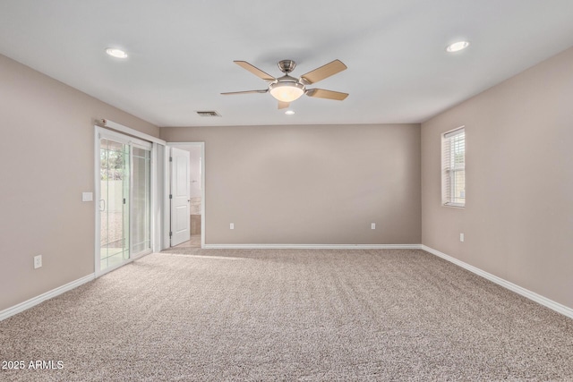 3034 E Turney Ave, Phoenix, AZ 85016 - unfurnished room with ceiling fan, light carpet, baseboards, and recessed lighting