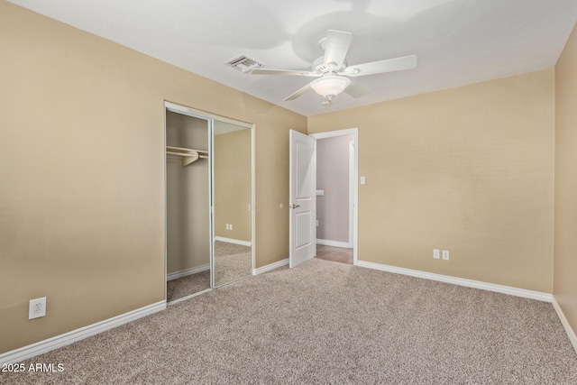 3034 E Turney Ave, Phoenix, AZ 85016 - unfurnished bedroom with carpet floors, a closet, baseboards, and ceiling fan